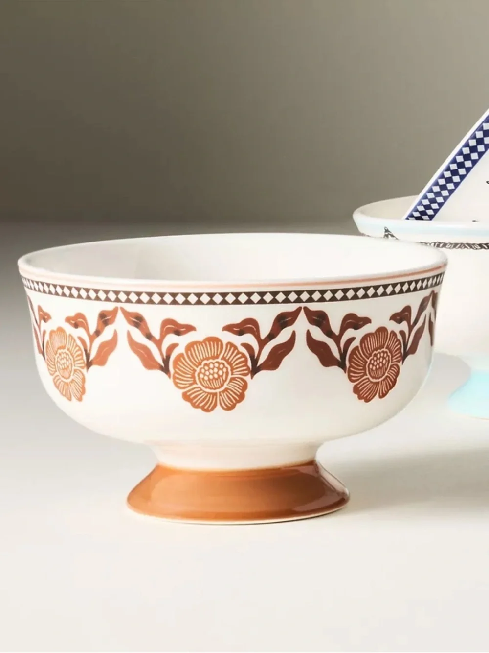 Anthropologie stoneware footed